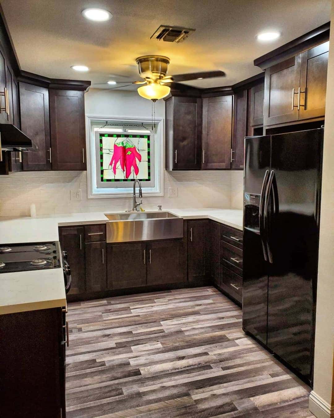 6. Dark Chocolate Brown Kitchen with Stainless Accents - brown kitchen ideas