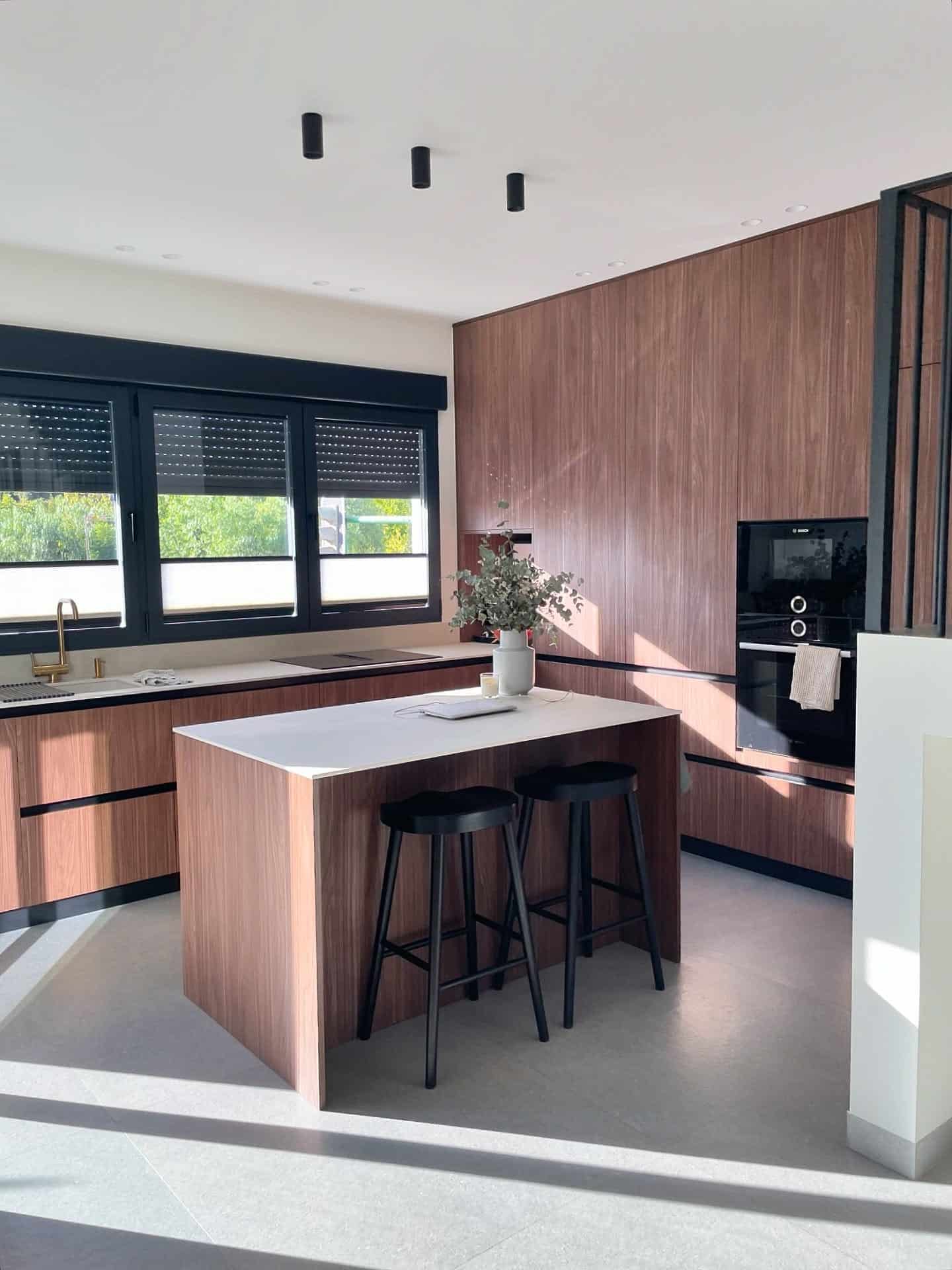 9. Modern Brown Cabinet Kitchen with Black Window Frames - brown kitchen ideas