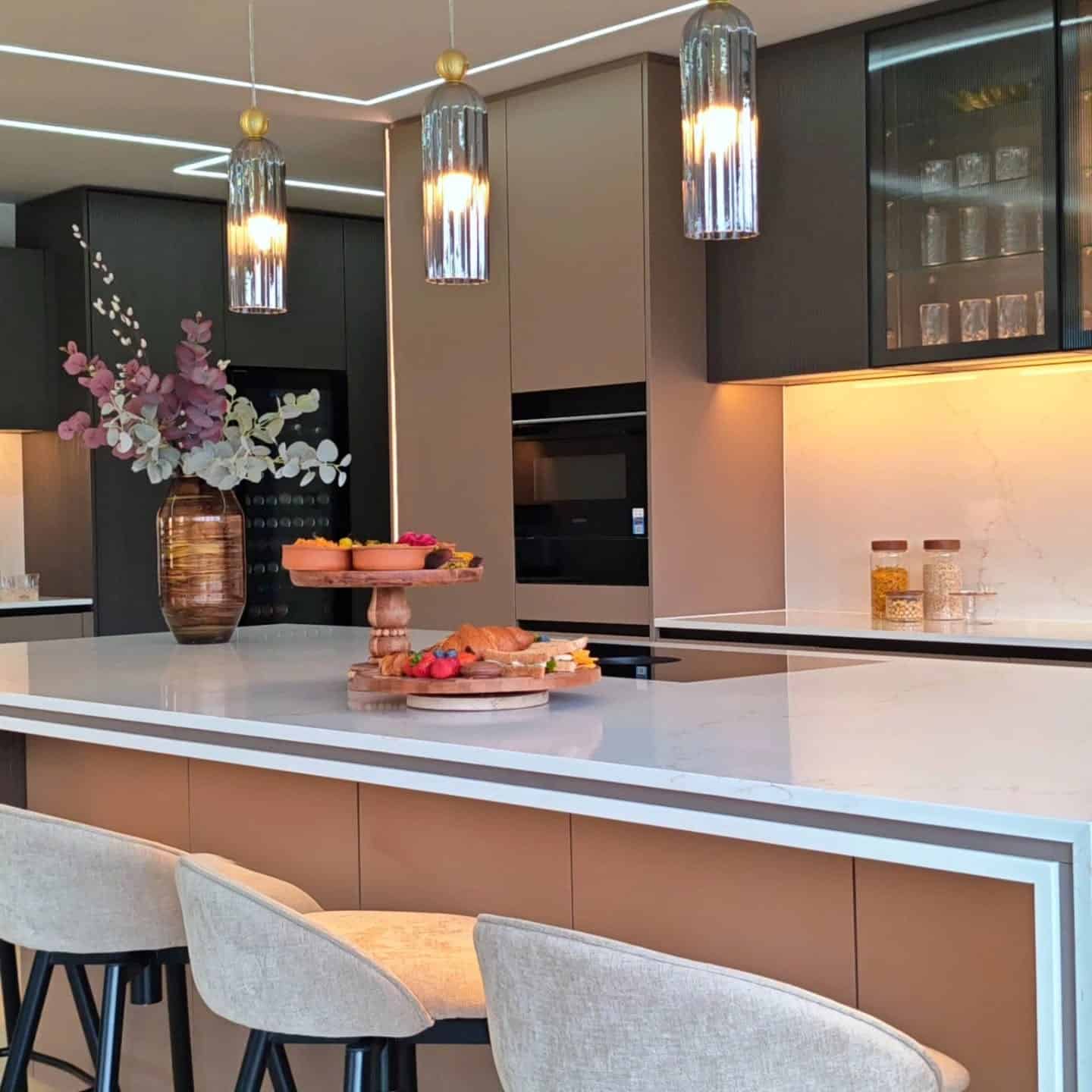 11. Soft Mocha Brown Kitchen with Modern Pendant Lighting - brown kitchen ideas