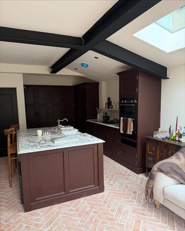 16. Rustic Brown Kitchen with Brick Flooring - brown kitchen ideas