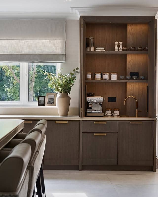 20. Warm Brown Coffee Bar Kitchen with Built-In Storage - brown kitchen ideas