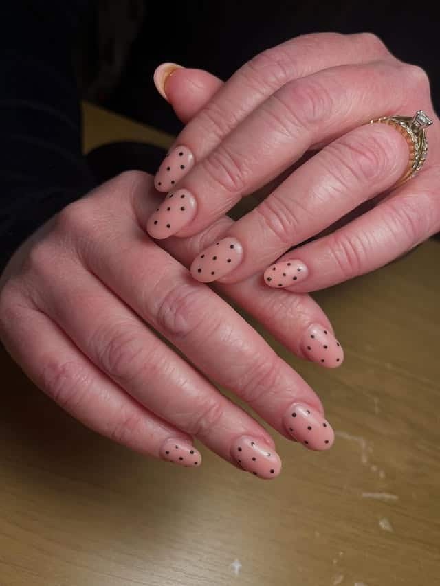 1. Nude Almond Nails with Minimal Black Polka Dots - minimalist nail ideas