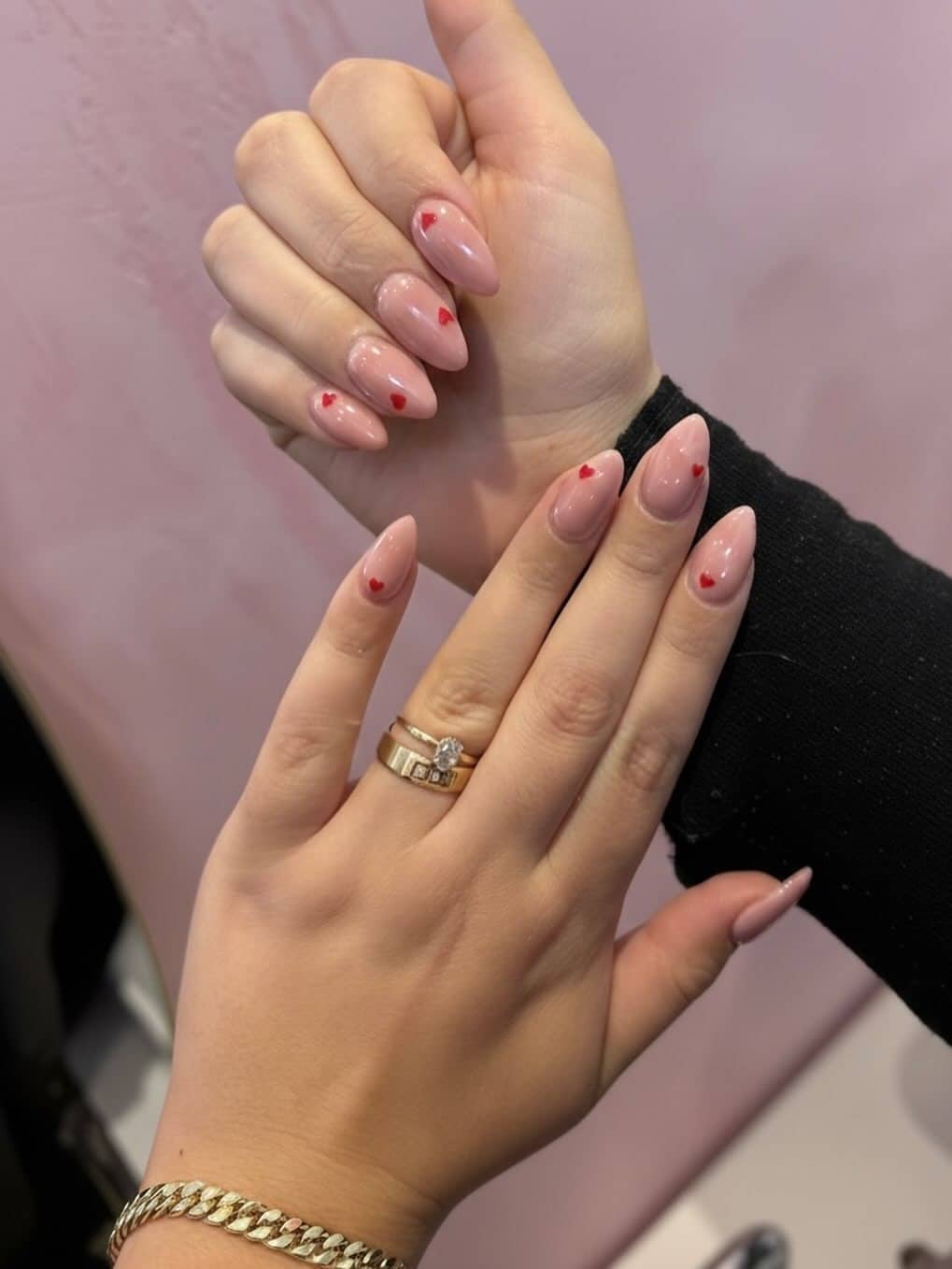 3. Blush Almond Nails with Tiny Red Heart Accents - minimalist nail ideas