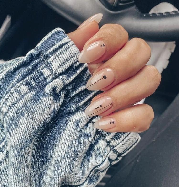 20. Beige Almond Nails with Minimal Black Dot and Line Details - minimalist nail ideas