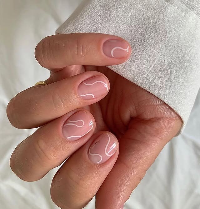 21. Blush Pink Short Round Nails with Minimal White Wave Lines - minimalist nail ideas