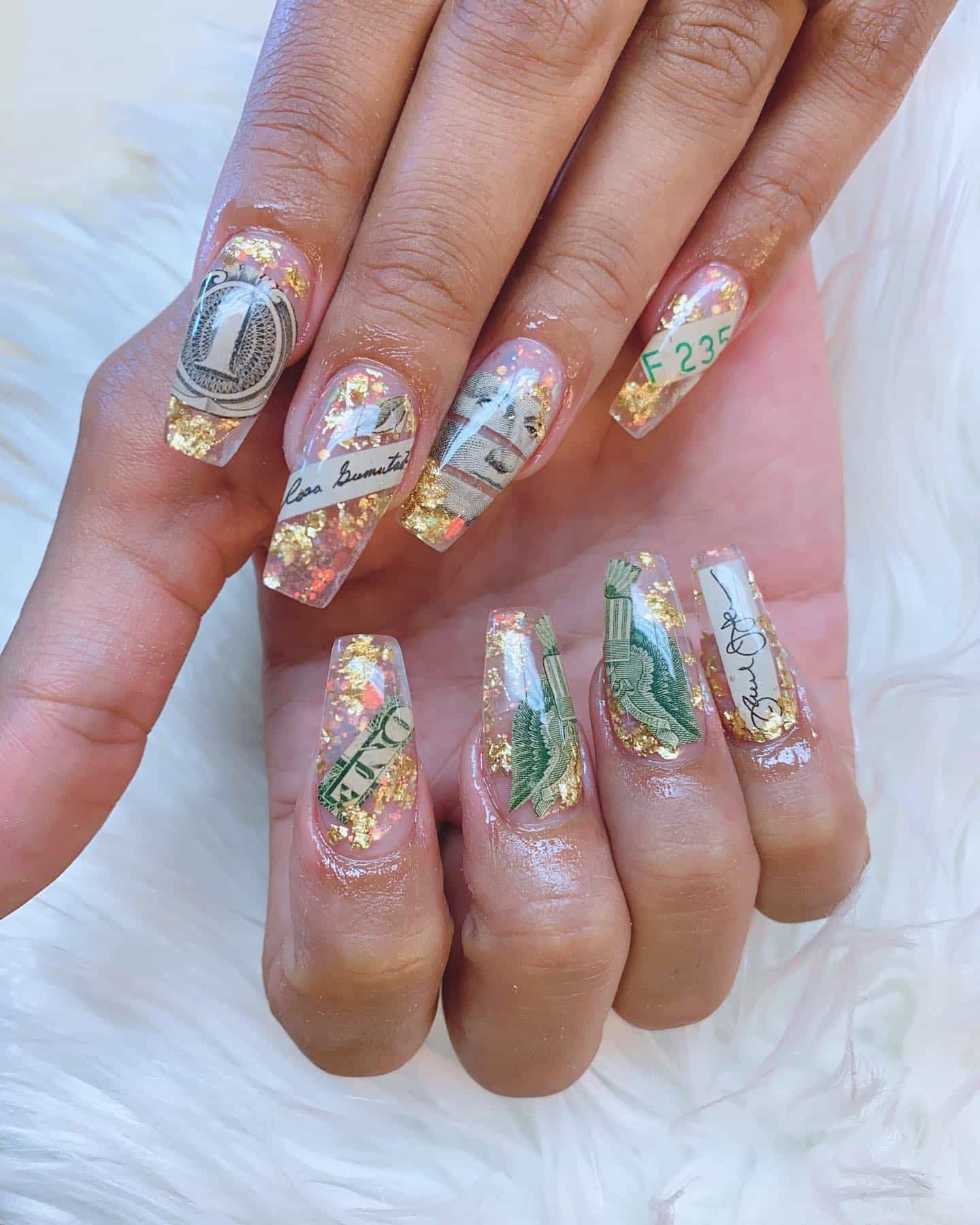12. Clear Coffin Money Nails with Gold Foil and Currency Art - money nail ideas