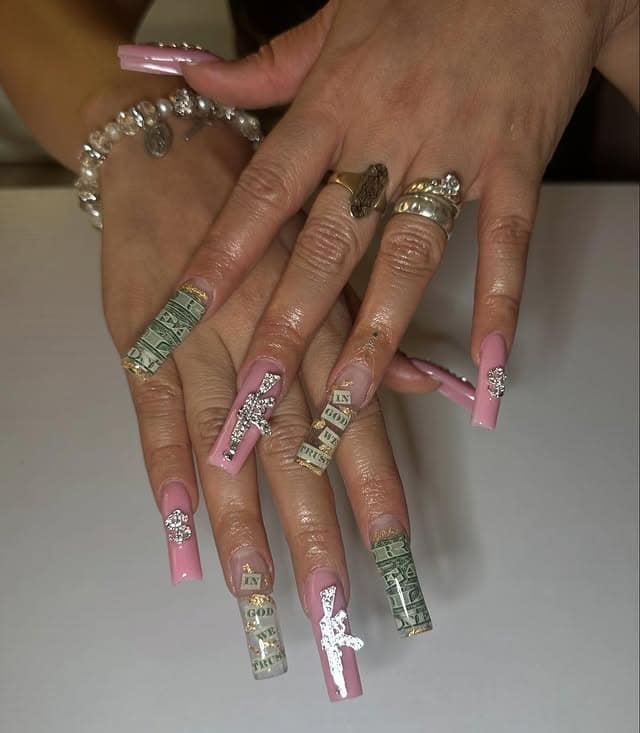 19. Pink Coffin Money Nails with Cross Charms and Dollar Art - money nail ideas