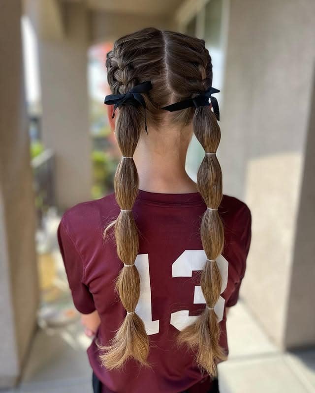 22. Double Dutch Braids with Light Brown Bubble Ponytails - Softball Hairstyles