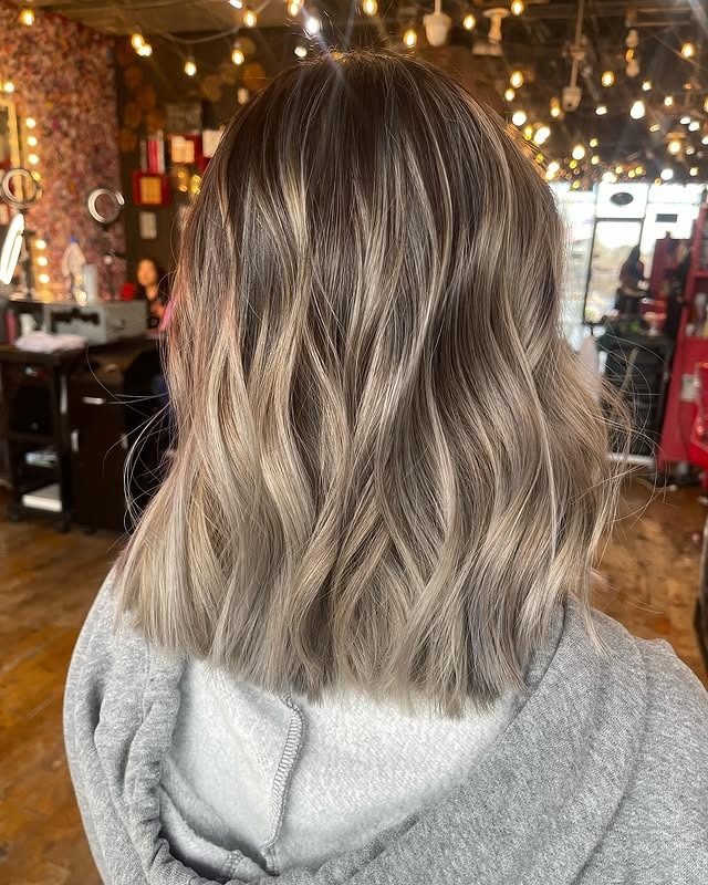 8. Golden Beige Blonde with Loose Texture - Light Hair Color