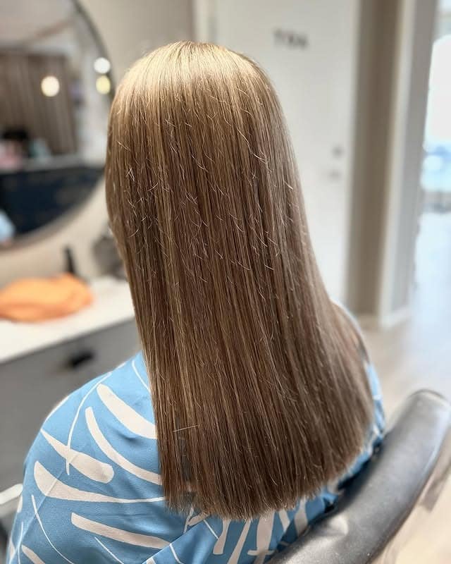 11. Smooth Sandy Blonde Blunt Cut - Light Hair Color