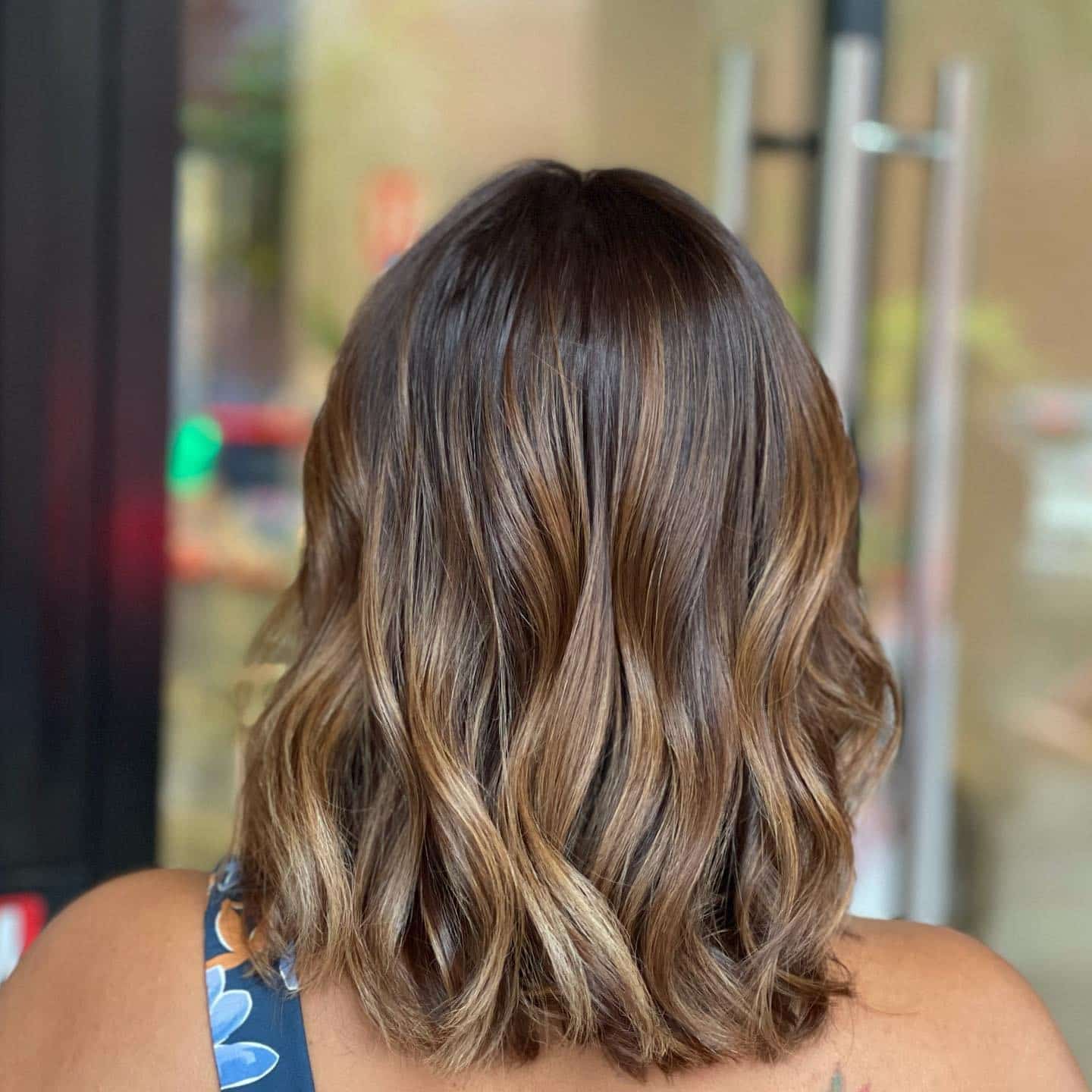 15. Caramel Bronde Wavy Lob - Light Hair Color