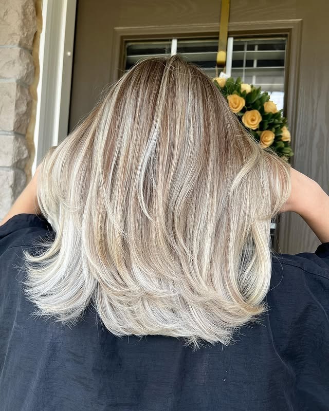 21. Platinum Beige Layered Blowout - Light Hair Color