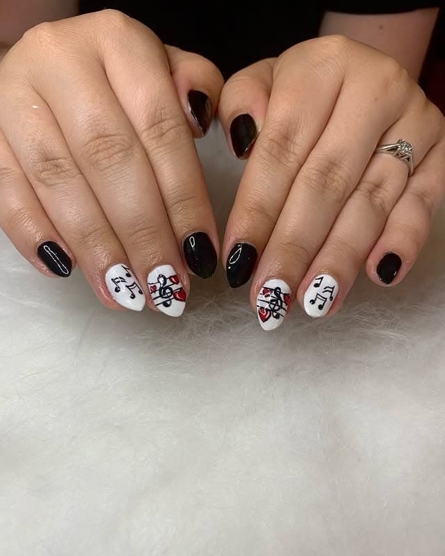2. Black and White Music Note Accent Nails - music nail ideas