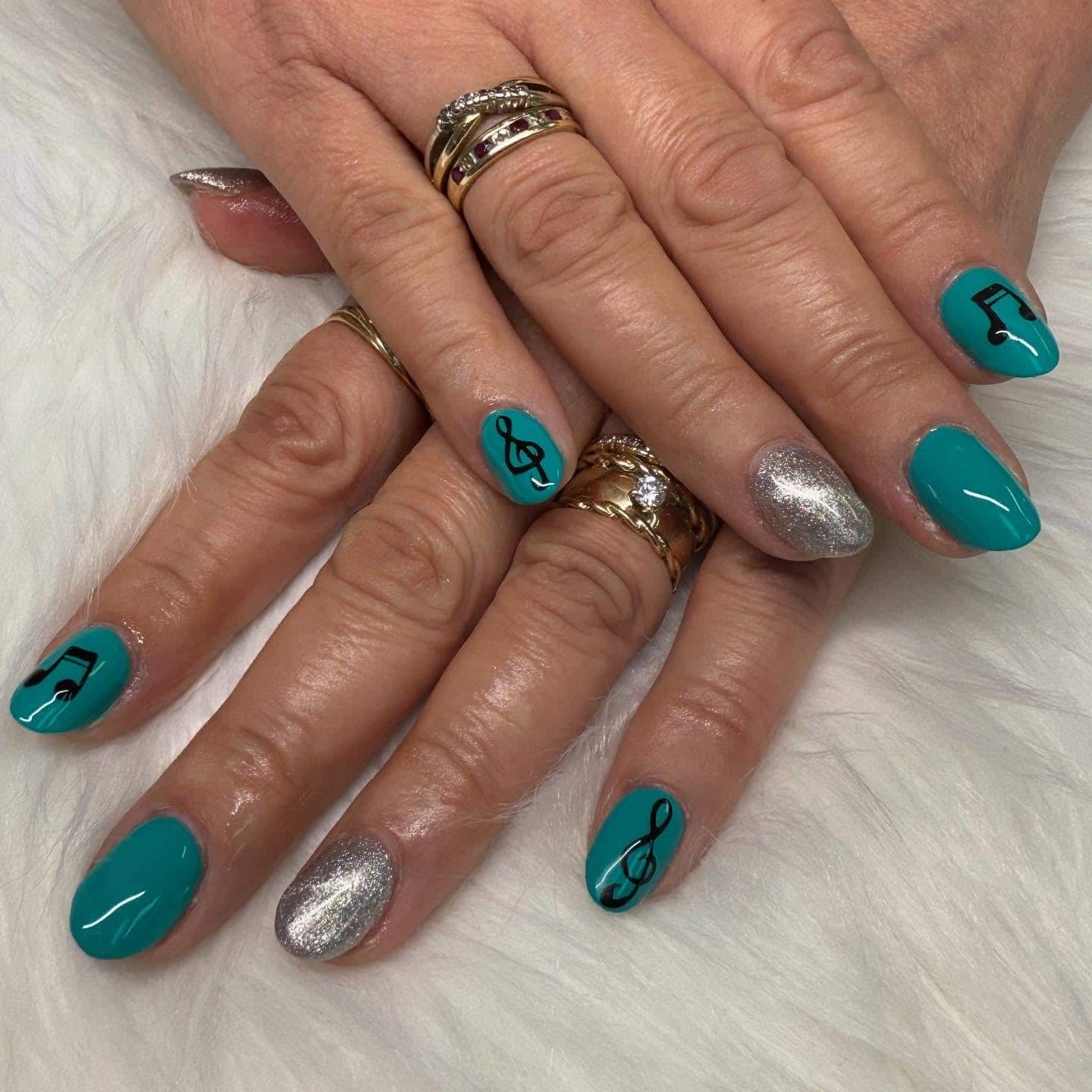 6. Teal Music Note Glossy Nails - music nail ideas
