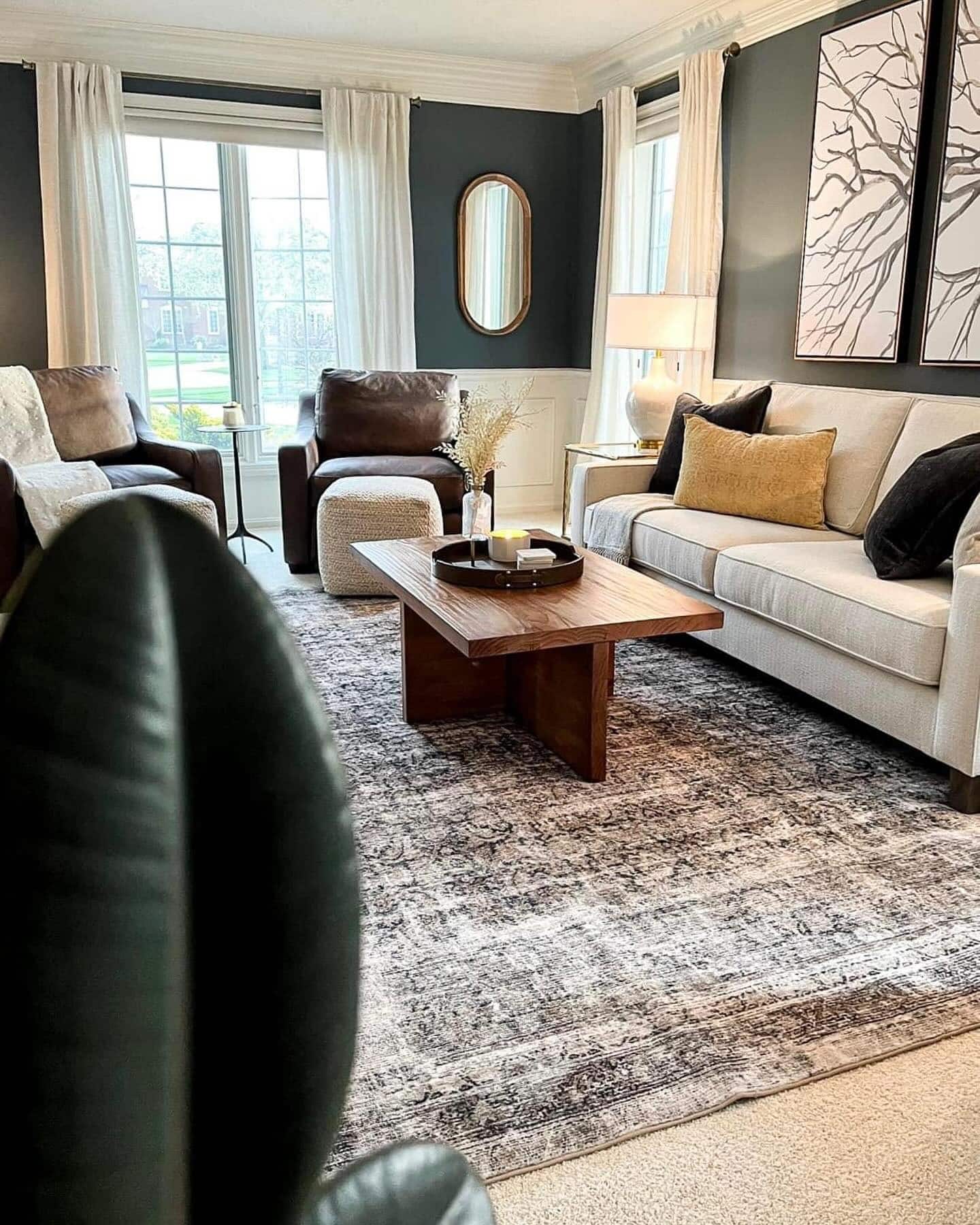 14. Cream and Espresso Living Room with Deep Green Accent Walls - earth tones living room ideas