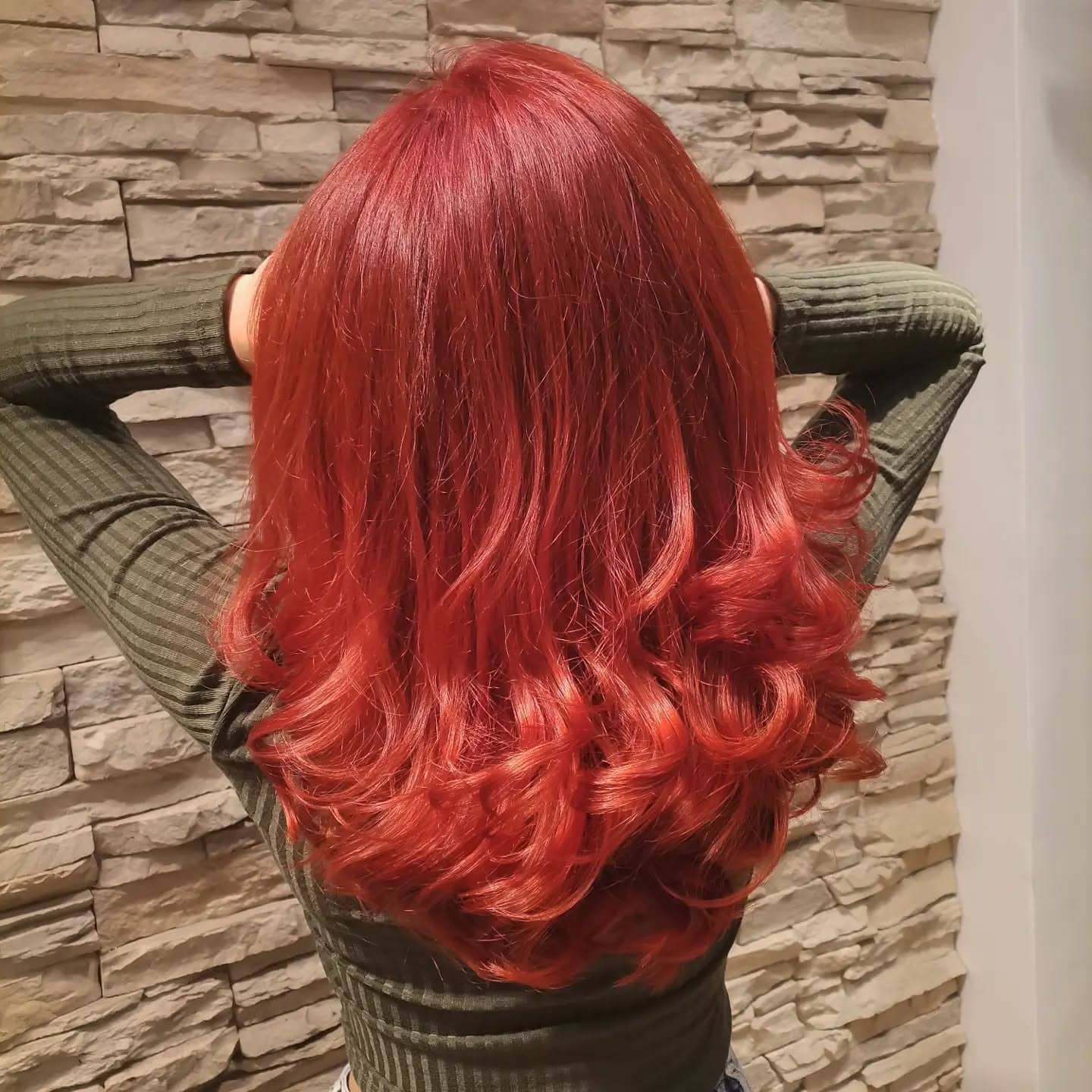 2. Vibrant Scarlet Red Layered Waves - Autumn Hair Colors