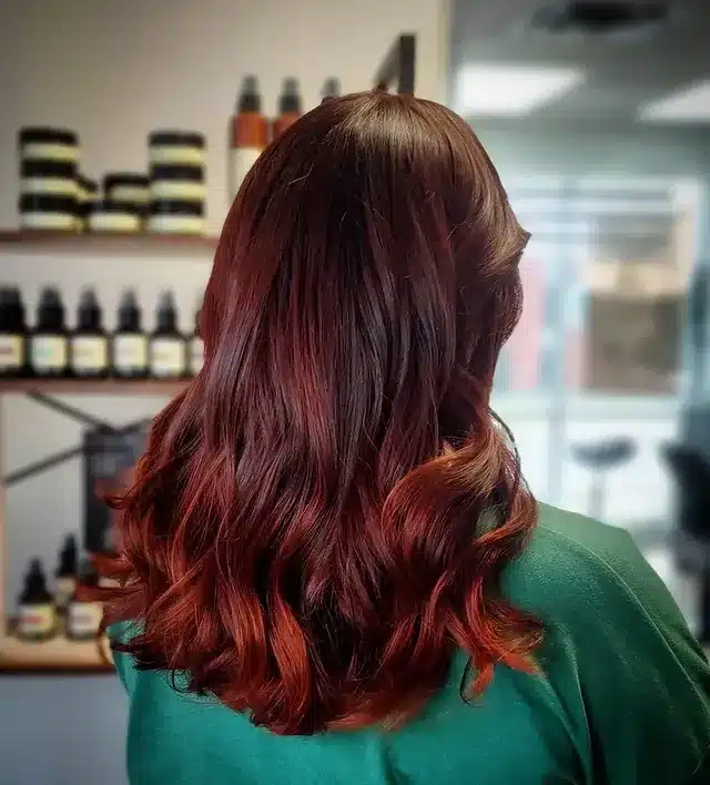 3. Deep Auburn Balayage with Soft Waves - Autumn Hair Colors