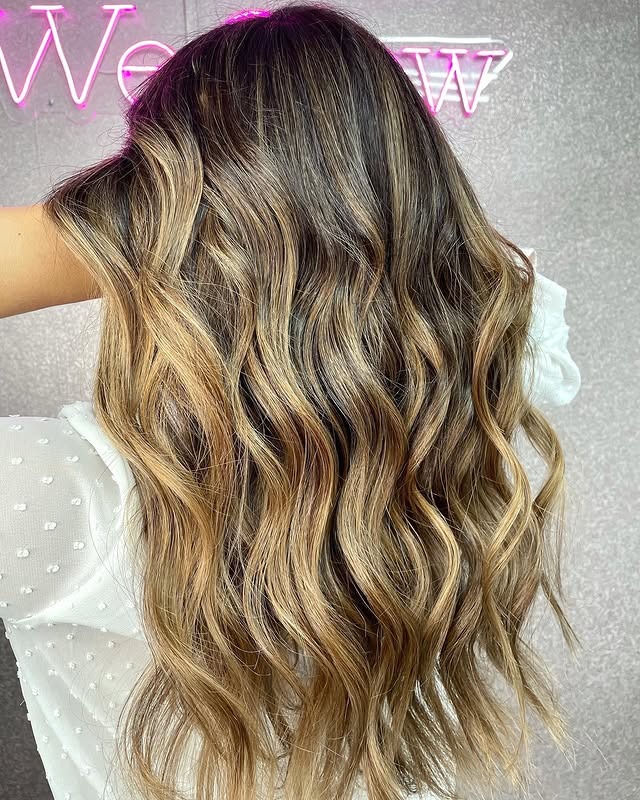 8. Golden Caramel Balayage Waves - Autumn Hair Colors