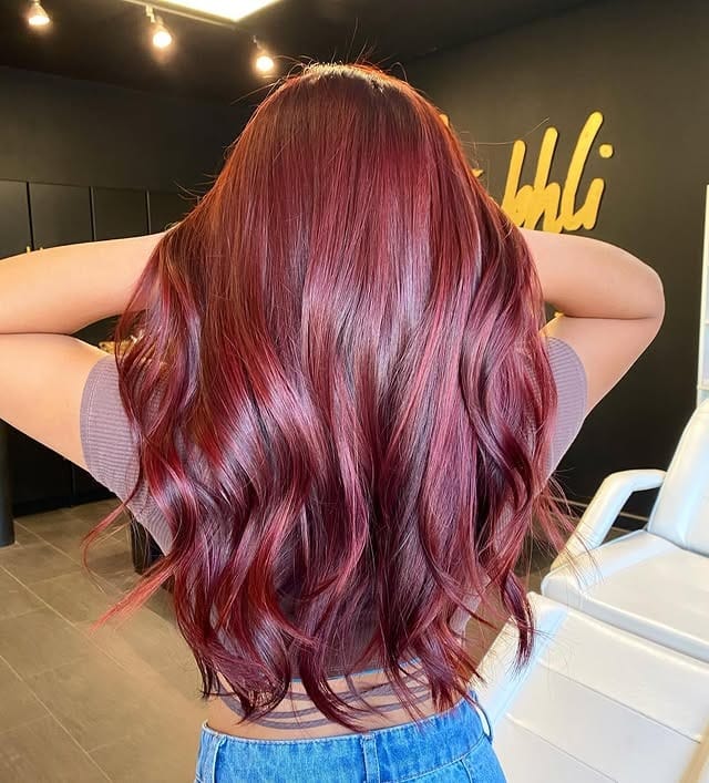 19. Deep Cherry Red Glossy Waves - Autumn Hair Colors