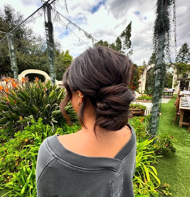 2. Romantic Brunette Twisted Low Bun - Elegant Hairstyles
