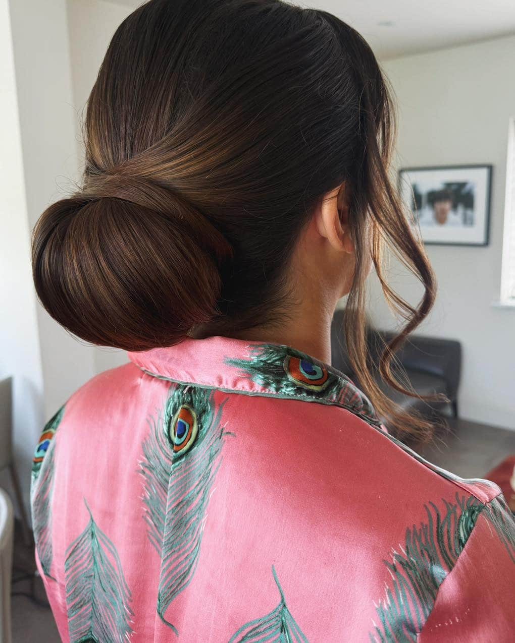 21. Espresso Brown Classic Low Chignon - Elegant Hairstyles