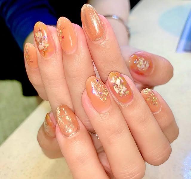 5. Peach Gold Foil Jelly Nails - nail ideas for vacation