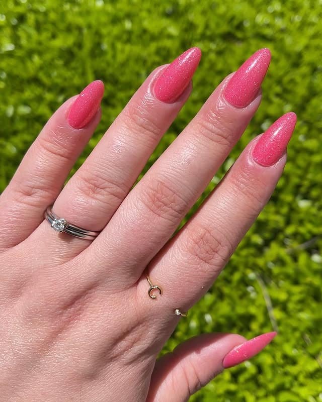 6. Coral Pink Shimmer Almond Nails - nail ideas for vacation