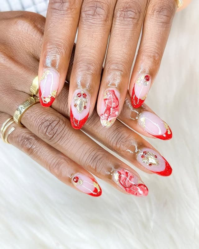 14. Red French Tip Gold Foil Almond Nails - nail ideas for vacation