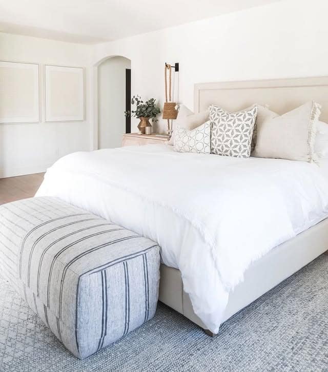 2. Soft Neutral White Bedroom with Textured Linen Accents - white bedroom ideas