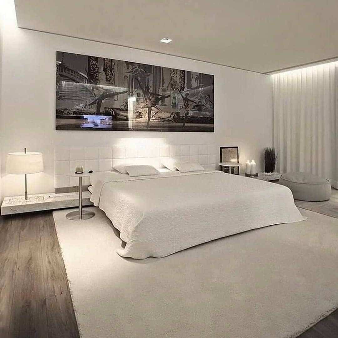 5. Luxury White Bedroom with Gallery Art Statement - white bedroom ideas