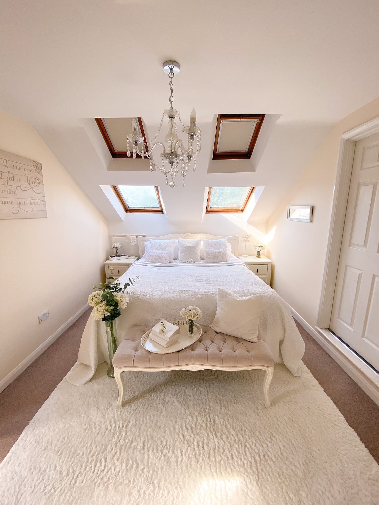 7. Cozy Attic White Bedroom with Skylight Windows - white bedroom ideas