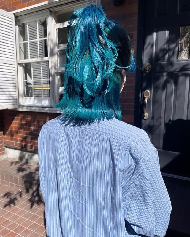 1. Teal Blue Layered Wolf Cut - Light Blue Hair Color