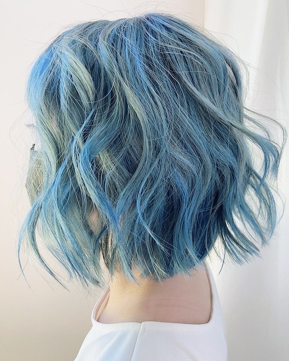 9. Textured Blue Melt Wavy Bob - Light Blue Hair Color