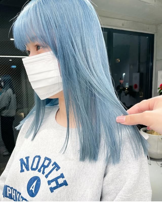 10. Ice Blue Sleek Layered Cut - Light Blue Hair Color