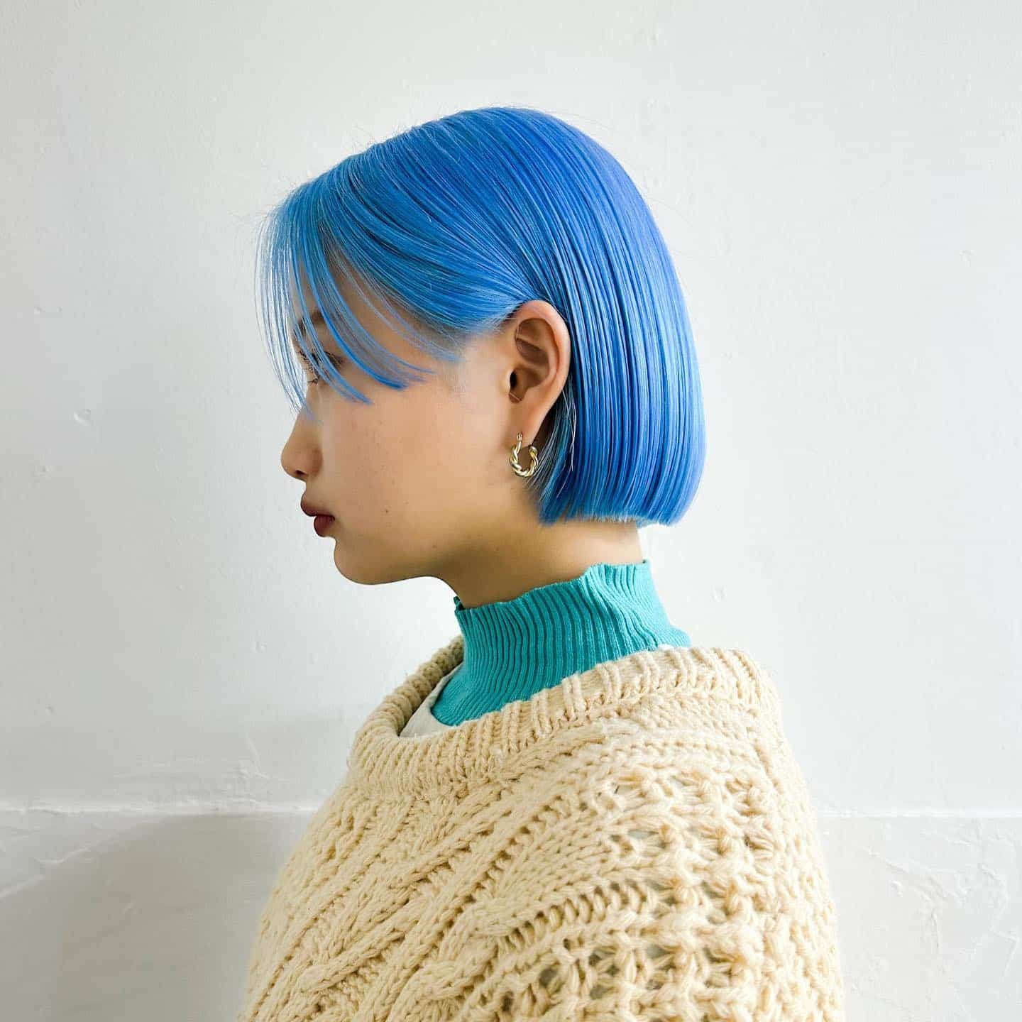 13. Bright Sky Blue Precision Bob - Light Blue Hair Color