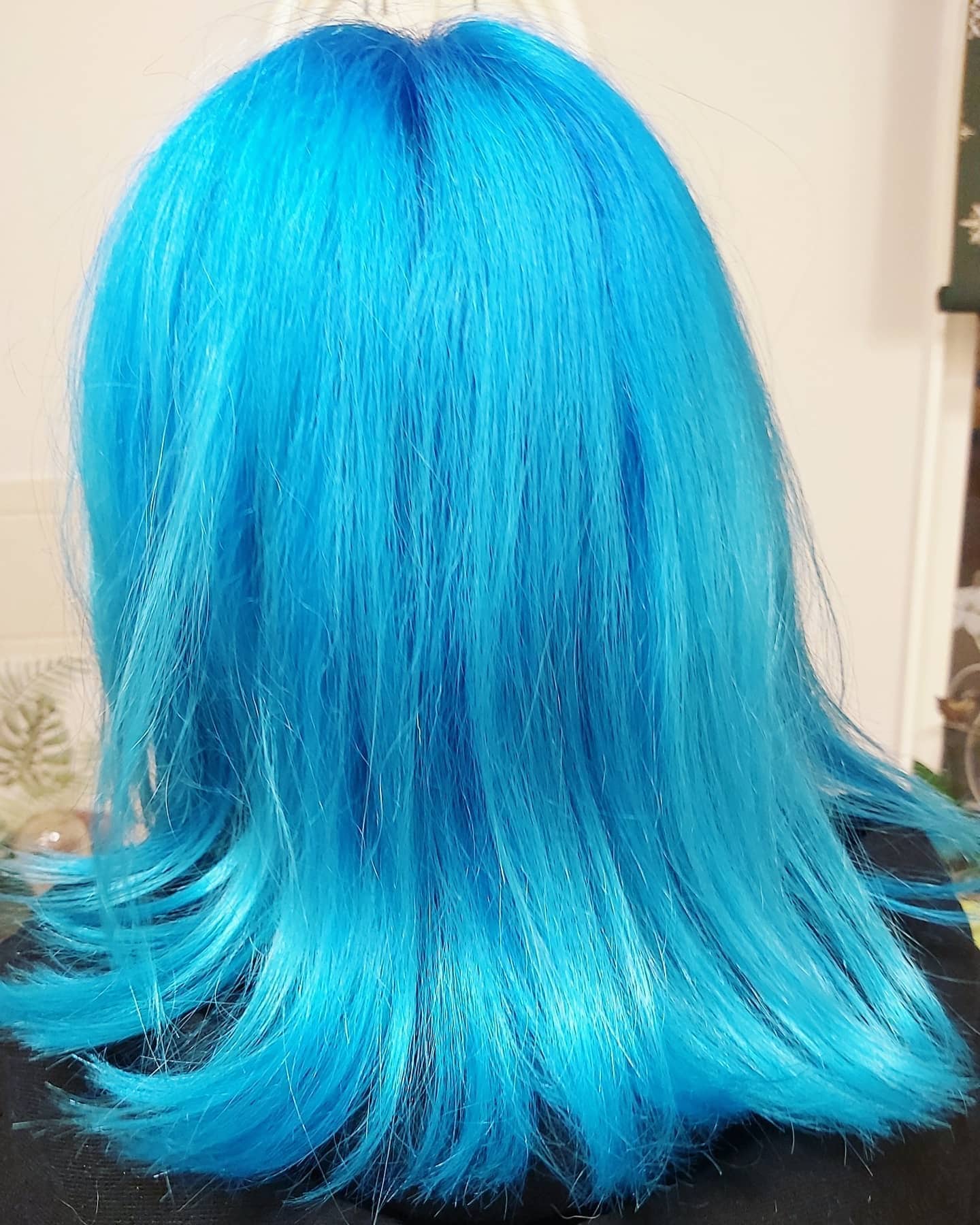 17. Vivid Aqua Blue Layered Mid-Length Cut - Light Blue Hair Color