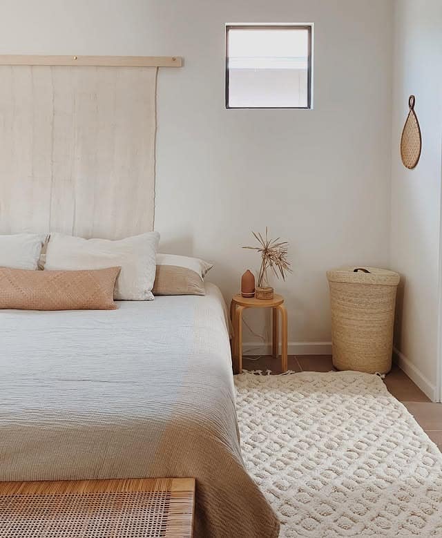 18. Minimal Earth Tone Bedroom with Soft Beige and Natural Textures - earth tones bedroom ideas