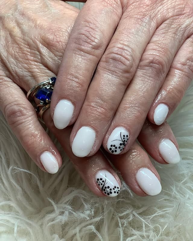 10. Milky Off White Almond Nails with Soft Shimmer Finish - off white nail ideas