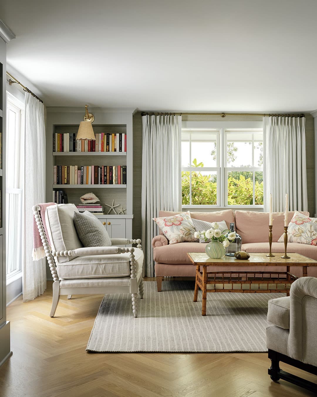 4. Soft Pastel Country Living Room with Blush Sofa and Brass Accents - country living room ideas