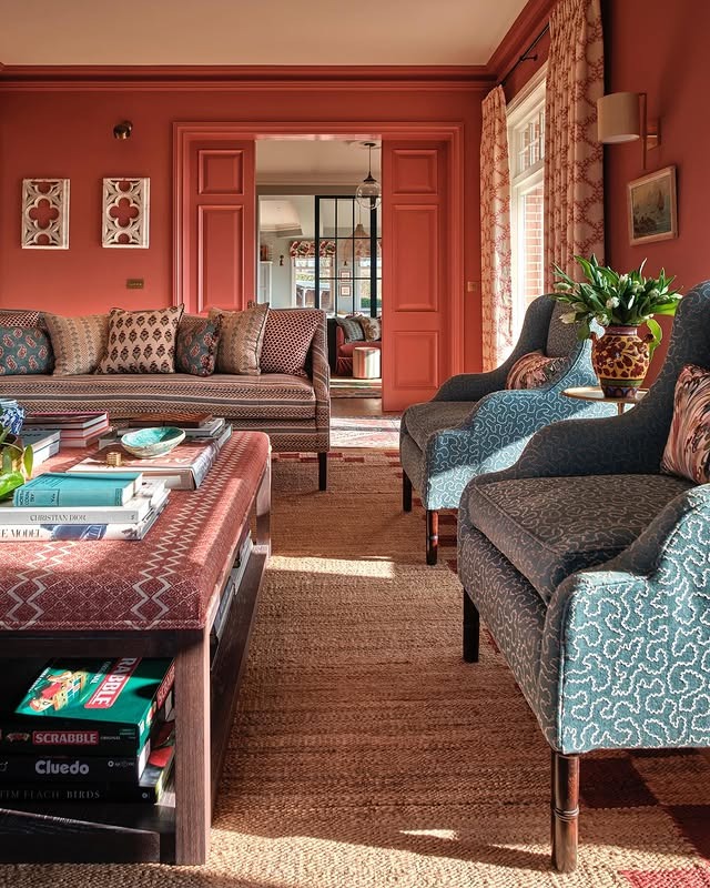 5. Warm Terracotta Country Living Room with Patterned Upholstery - country living room ideas
