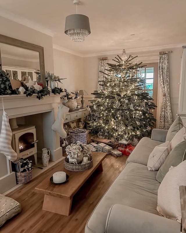 8. Festive Country Living Room with Neutral Palette and Natural Wood - country living room ideas