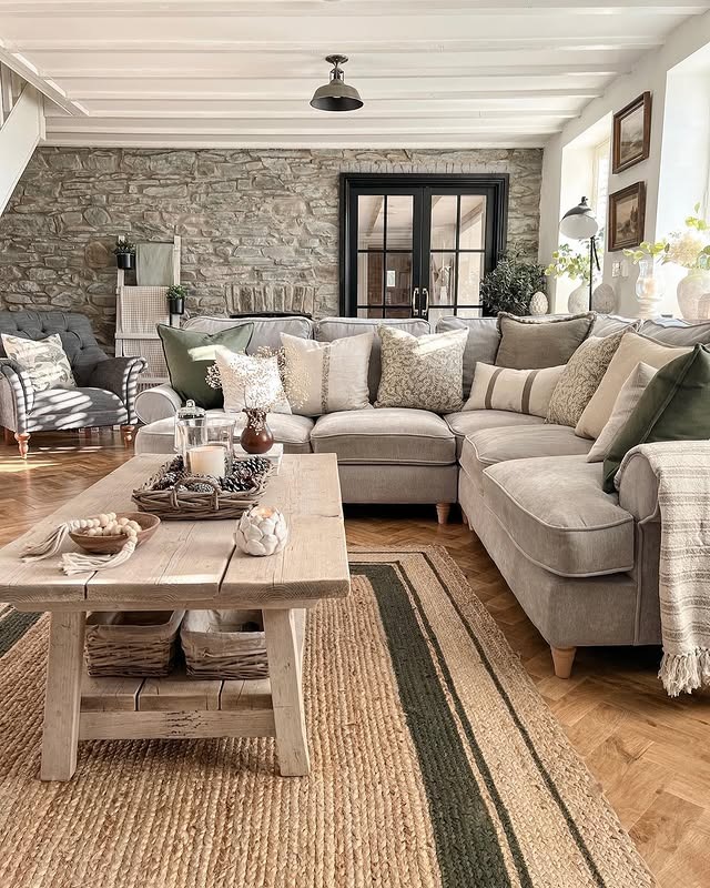 21. Rustic Stone Country Living Room with Beige and Olive Accents - country living room ideas