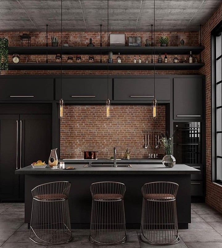 9. Modern Industrial Kitchen with Black Cabinetry and Brick Feature Wall - industrial kitchen ideas