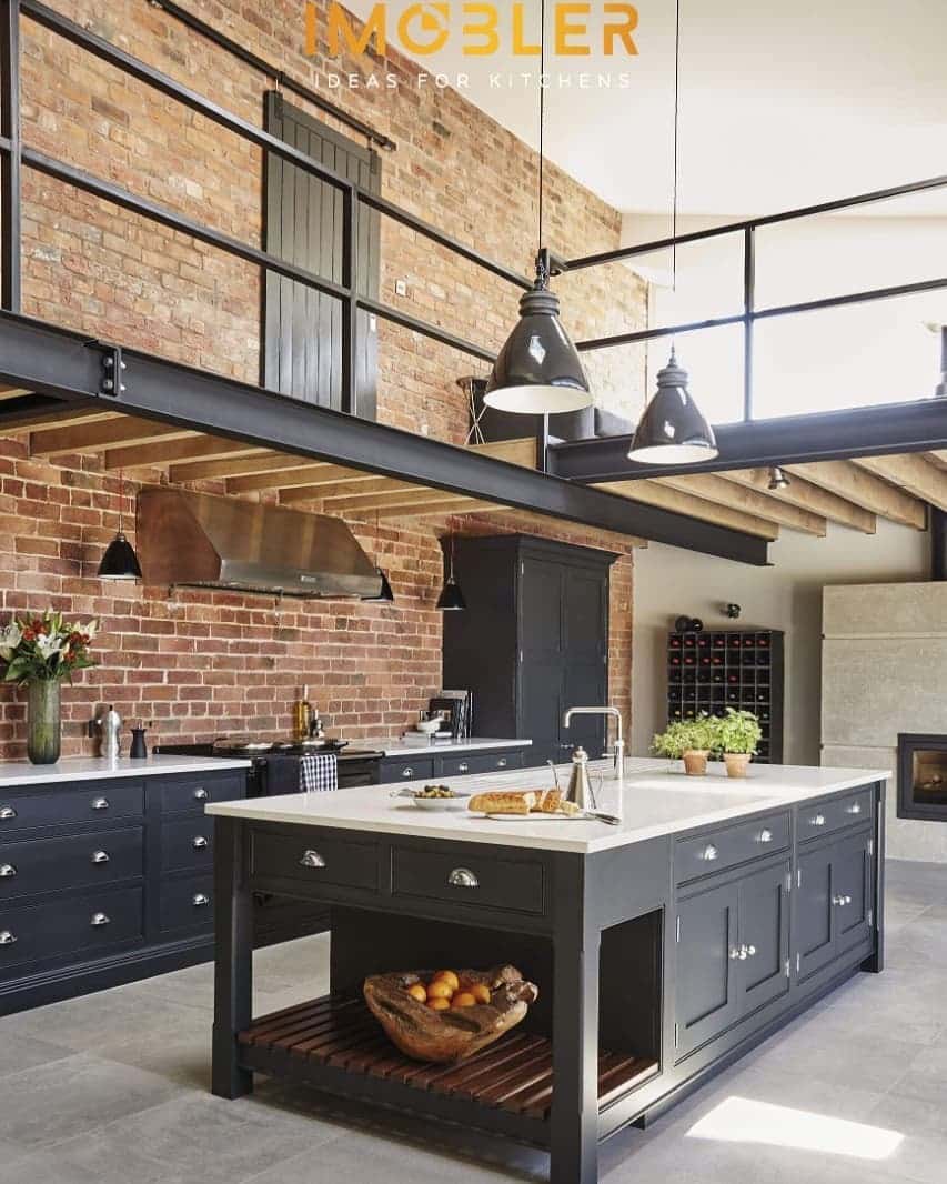 16. Brick Loft Industrial Kitchen with Black Cabinets and Steel Beams - industrial kitchen ideas