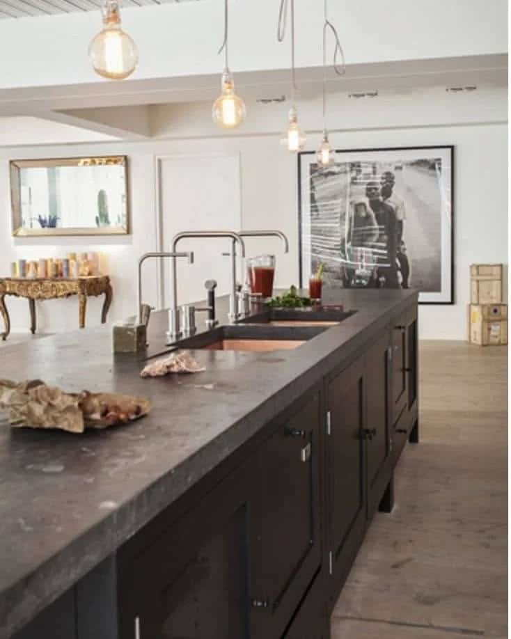 19. Industrial Kitchen Island with Dark Cabinetry and Concrete Countertop - industrial kitchen ideas