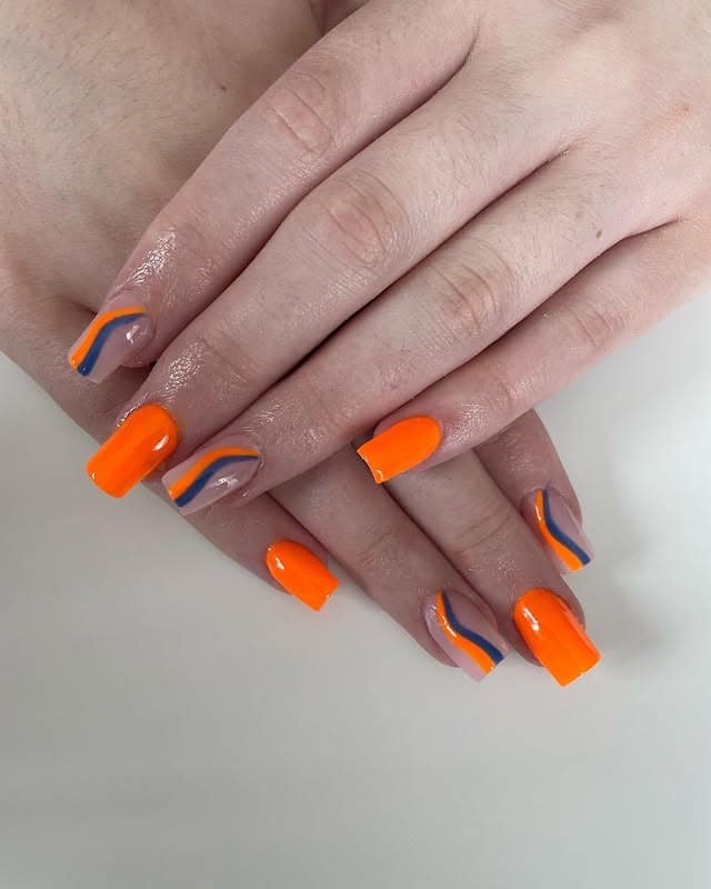 4. Square Neon Orange Nails with Blue Wave Lines - orange and blue nail ideas
