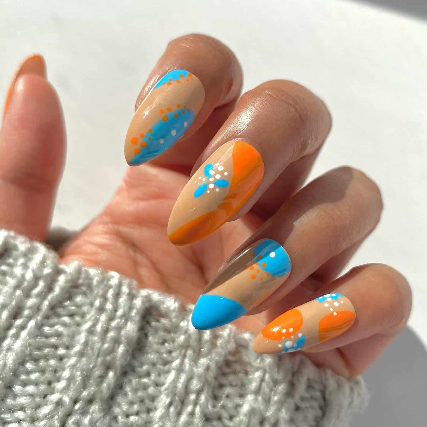 10. Almond Nude Nails with Orange and Blue Dot Art - orange and blue nail ideas