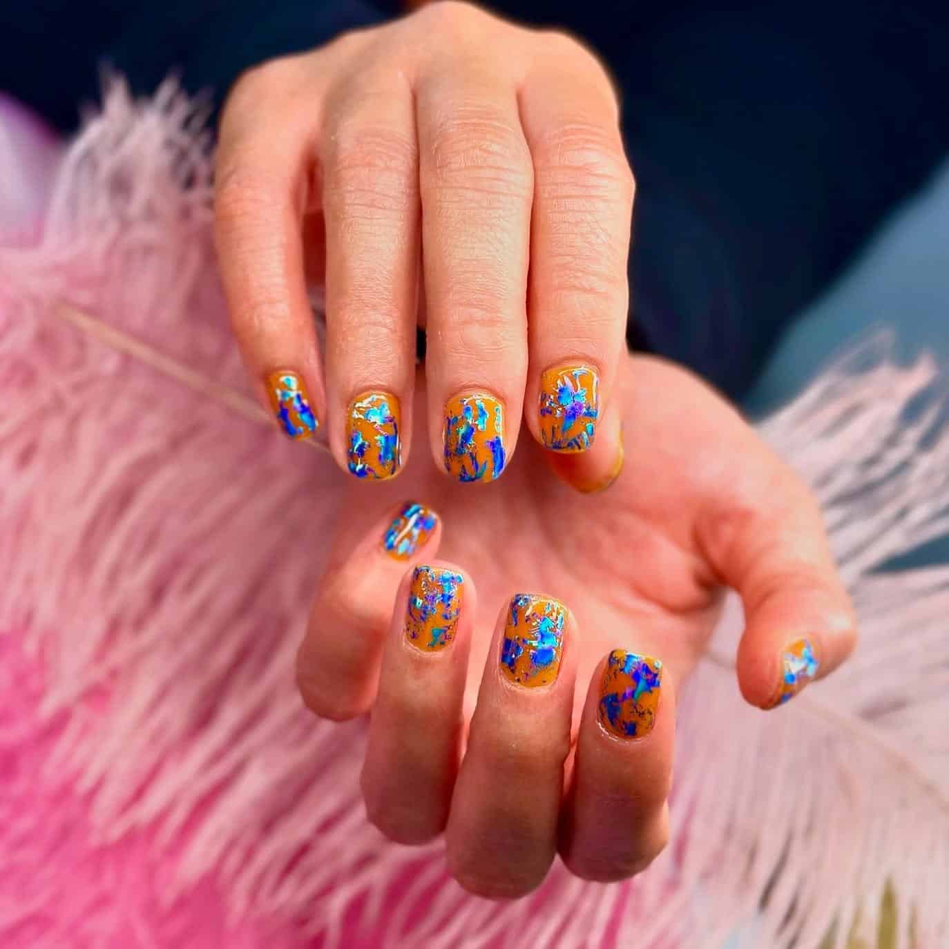 11. Short Orange Nails with Blue Foil Abstract Art - orange and blue nail ideas