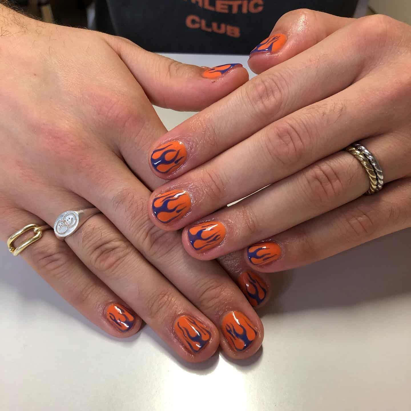 12. Short Orange Flame Nails with Blue Flame Art - orange and blue nail ideas