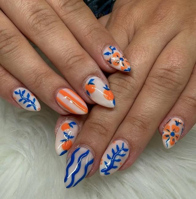 14. Almond Nude Nails with Orange Floral and Blue Leaf Nail Art - orange and blue nail ideas